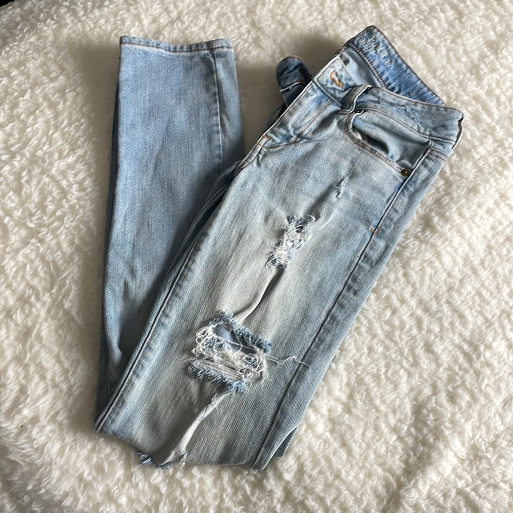 American Eagle Distressed/Ripped Skinny Jeans in Light Blue - Size 00